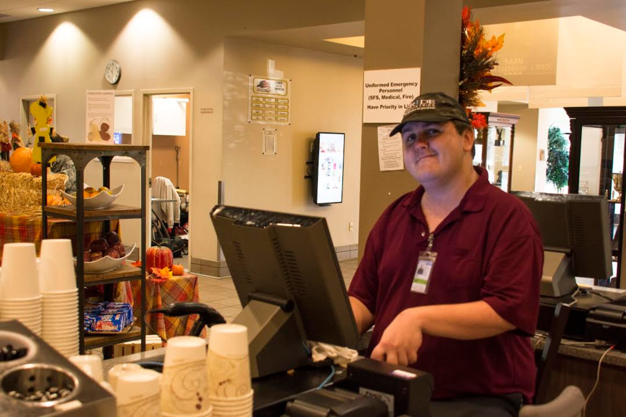 David H. Grout, Pride Industries food attendant and cashier, readies his work station for an imminent lunch rush November 1, 2017, at Travis Air Force Base, California. Grout has worked for Travis for four years.