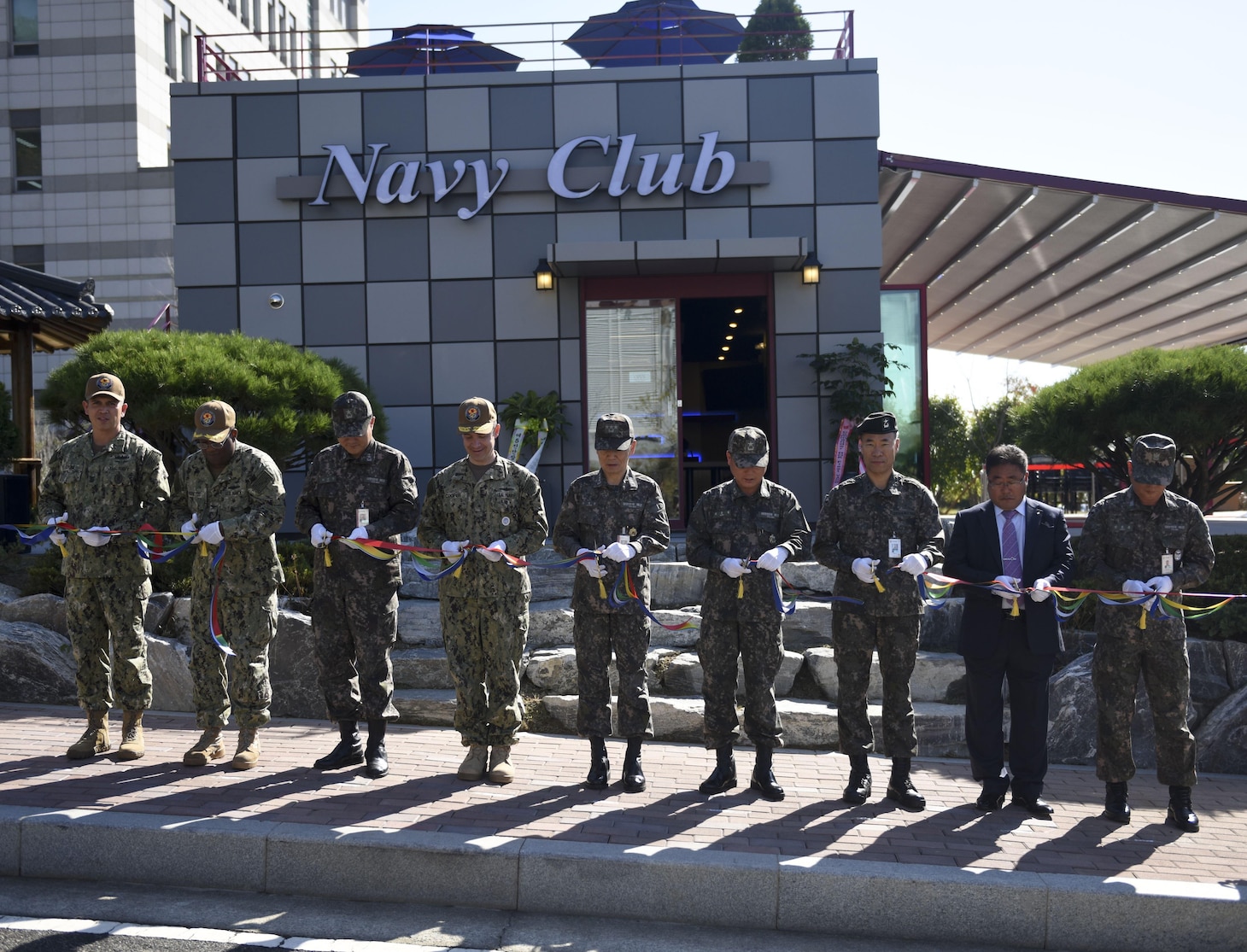 BUSAN, Republic of Korea (Nov. 01, 2017) Rear Adm. Brad Cooper, commander, U.S. Naval Forces Korea (CNFK), and Republic of Korea (ROK) Navy Vice Adm. Jung, Jin-Sup, commander, ROK Fleet, participate in a ribbon cutting ceremony of the combined U.S. - ROK Navy Club at ROK Fleet headquarters. The Navy Club began construction September 1, 2017 and was a joint project between U.S. and ROK forces.
