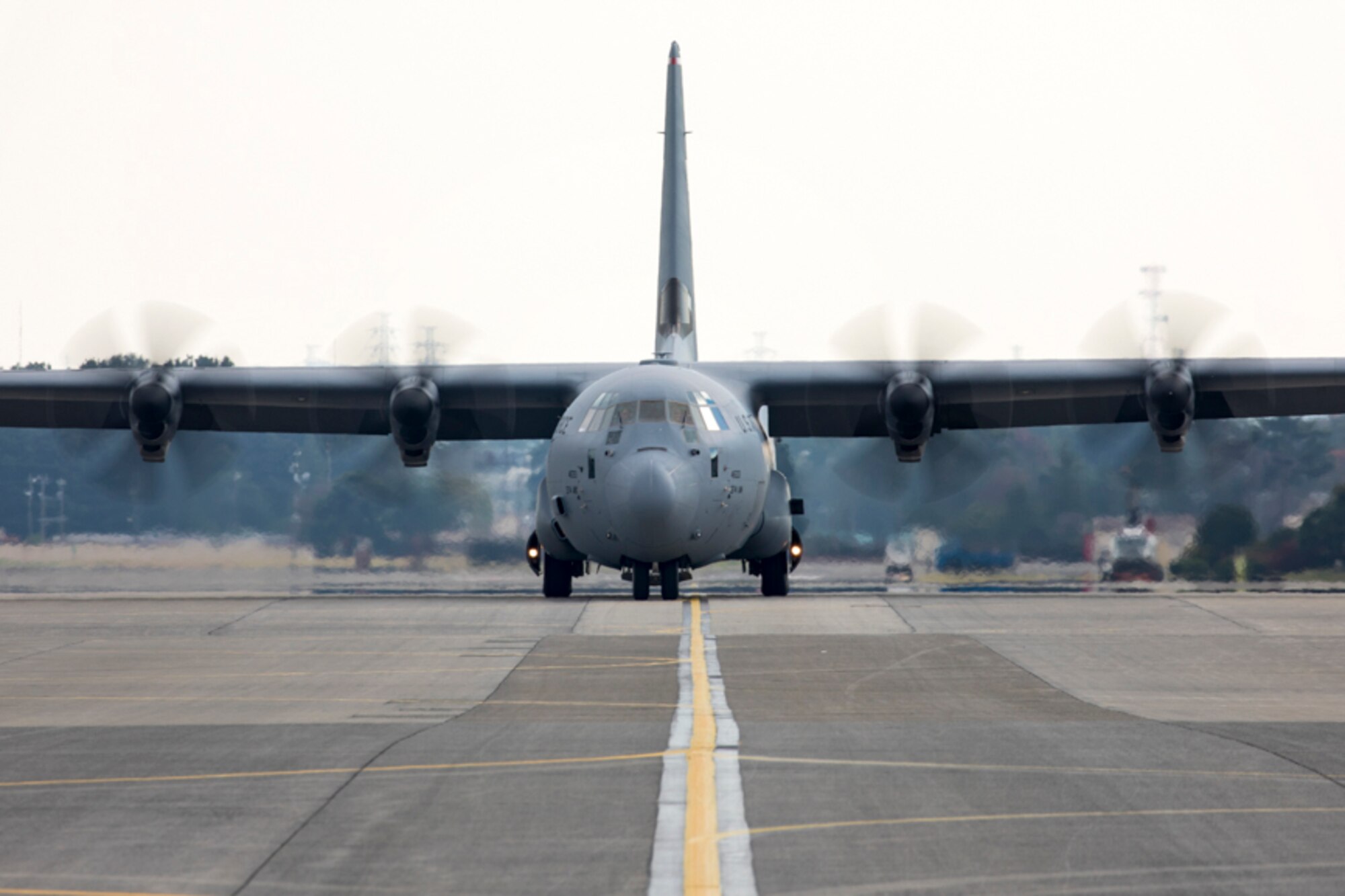 An Air Force C-130J Super Hercules taxies on the flightline at Yokota Air Base, Japan, Nov. 1, 2017