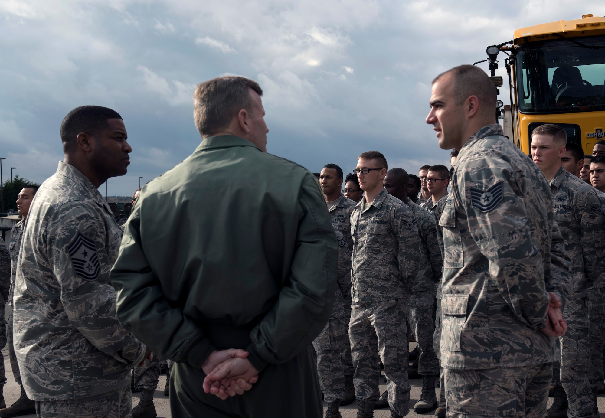 U.S. Air Force Gen. Tod D. Wolters, U.S. Air Forces in Europe and Air Forces Africa commander, tests a piece of equipment for cracks with Tech. Sgt. James Cone and Staff Sgt. Timothy J. Schwenning II, both 86th Maintenance Squadron Nondestructive Inspection technicians, during an immersion tour on Ramstein Air Base, Germany, Oct. 23, 2017. Wolters coined all four Airmen assigned to the shop for their efforts in finding the best course of action for detecting cracks in the equipment saving the Air Force money. (U.S. Air Force photo by Senior Airman Tryphena Mayhugh)