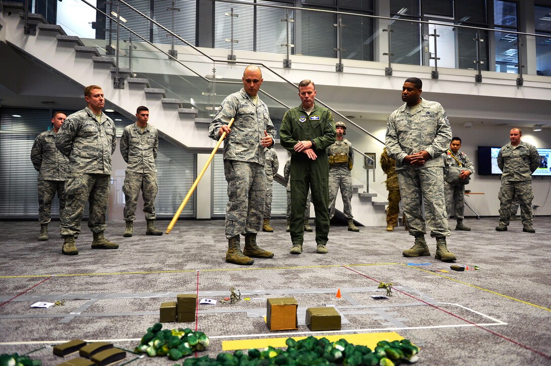 U.S. Air Force Gen. Tod D. Wolters, U.S. Air Forces in Europe and Air Forces Africa commander, receives a briefing about contingency operations at Ramstein Air Base, Germany, Oct. 23, 2017. Wolters visited the 435th Air Ground Operations Wing where he spoke to officials from various units. (U.S. Air Force photo by Airman 1st Class Joshua Magbanua)