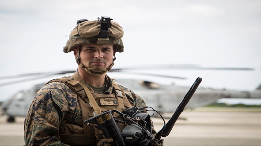 U.S. Marine Capt. David Miller prepares to conduct a simulated night raid with multiple rifle squads during an air assault training event at Marine Corps Air Station Futenma, Okinawa, Japan, Oct. 31, 2017.