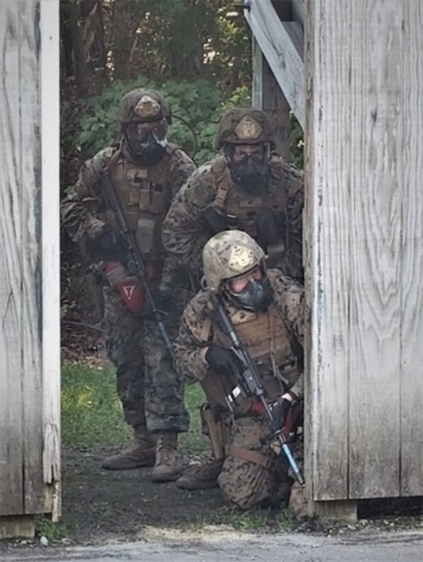 Marines from 4th platoon, Charlie Co. Fleet Anti-terrorism Security Team, U.S. Marine Corps Security Forces Regiment, executes a military operations in urban terrain (MOUT) field exercise at Naval Support Activity Northwest Annex, Munro Village, Chesapeake, Va., from Oct. 18-20 
The training was designed to improve interior tactics and validate skills in searching objectives, and clear-and-contain procedures. (Official U.S. Marine Corps courtesy photo/Released)