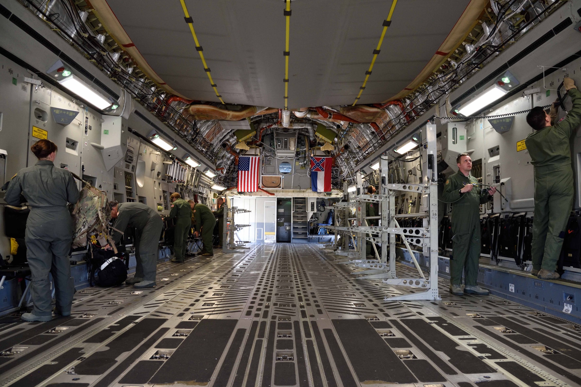 Members of the Air Force Reserve 36th Aeromedical Evacuation Squadron and other Air National Guard units prepare a C-17 Globemaster III aircraft from the 183rd Airlift Squadron to receive simulated patients Oct. 30, 2017, during Southern Strike 2018 at the Gulfport Combat Readiness Training Center, Mississippi. Southern Strike 2018 is a large-scale, joint multinational combat exercise that provides tactical level training for the full spectrum of conflict and emphasizes air dominance, maritime operations, maritime air support, precision engagement, close air support, command and control, personnel recovery, aeromedical evacuation, and combat medical support. (U.S. Air Force photo by Tech. Sgt. Ryan Labadens)