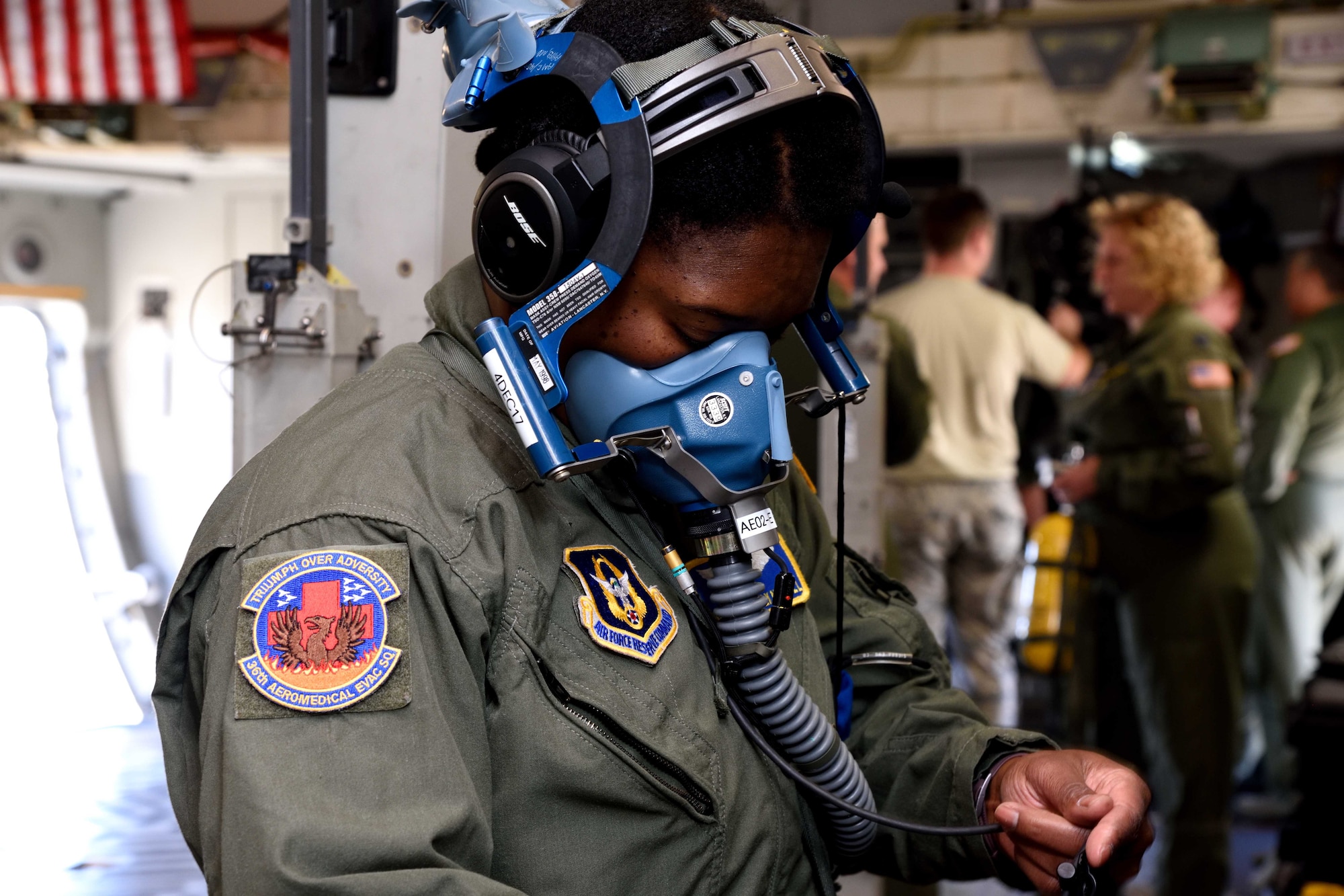 Master Sgt. Kimelyn Hall, 36th Aeromedical Evacuation Squadron aeromedical evacuation technician, tests her self-contained breathing apparatus on a C-17 Globemaster III aircraft from the 183rd Airlift Squadron during Southern Strike 2018 at the Gulfport Combat Readiness Training Center, Mississippi, Oct. 30, 2017. Southern Strike 2018 is a large-scale, joint multinational combat exercise that provides tactical level training for the full spectrum of conflict and emphasizes air dominance, maritime operations, maritime air support, precision engagement, close air support, command and control, personnel recovery, aeromedical evacuation, and combat medical support. (U.S. Air Force photo by Tech. Sgt. Ryan Labadens)