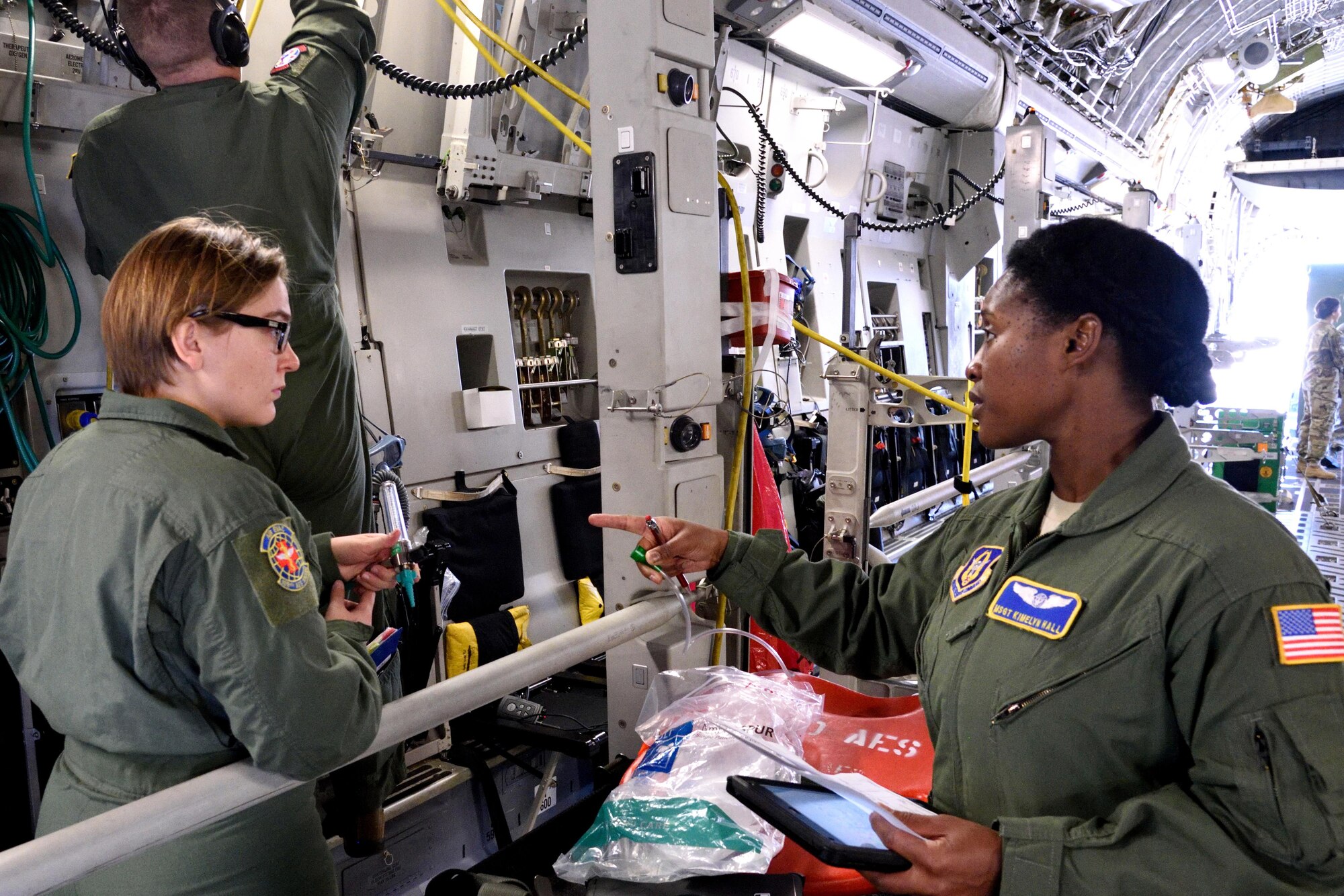 Master Sgt. Kimelyn Hall (right), 36th Aeromedical Evacuation Squadron aeromedical evacuation technician, works with other aeromedical evacuation members form Air National Guard units to prepare a C-17 Globemaster III aircraft for receiving simulated patients during Southern Strike 2018 at the Gulfport Combat Readiness Training Center, Mississippi, Oct. 30, 2017. Southern Strike 2018 is a large-scale, joint multinational combat exercise that provides tactical level training for the full spectrum of conflict and emphasizes air dominance, maritime operations, maritime air support, precision engagement, close air support, command and control, personnel recovery, aeromedical evacuation, and combat medical support. (U.S. Air Force photo by Tech. Sgt. Ryan Labadens)