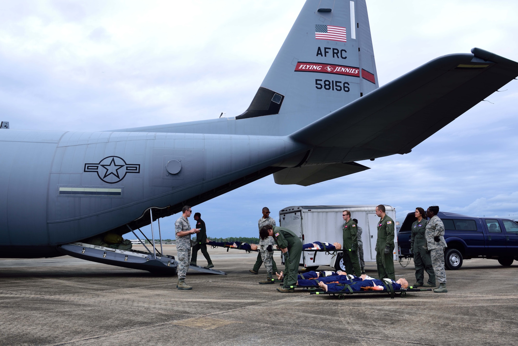 Members from various aeromedical evacuation squadrons load simulated patients onto an 815th Airlift Squadron C-130 Super Hercules aircraft at the Gulfport Combat Readiness Training Center, Mississippi, during an aeromedical evacuation exercise Nov. 1, 2017, for Southern Strike 2018. Southern Strike 2018 is a large-scale, joint multinational combat exercise that provides tactical level training for the full spectrum of conflict and emphasizes air dominance, maritime operations, maritime air support, precision engagement, close air support, command and control, personnel recovery, aeromedical evacuation, and combat medical support. (U.S. Air Force photo by Tech. Sgt. Ryan Labadens)