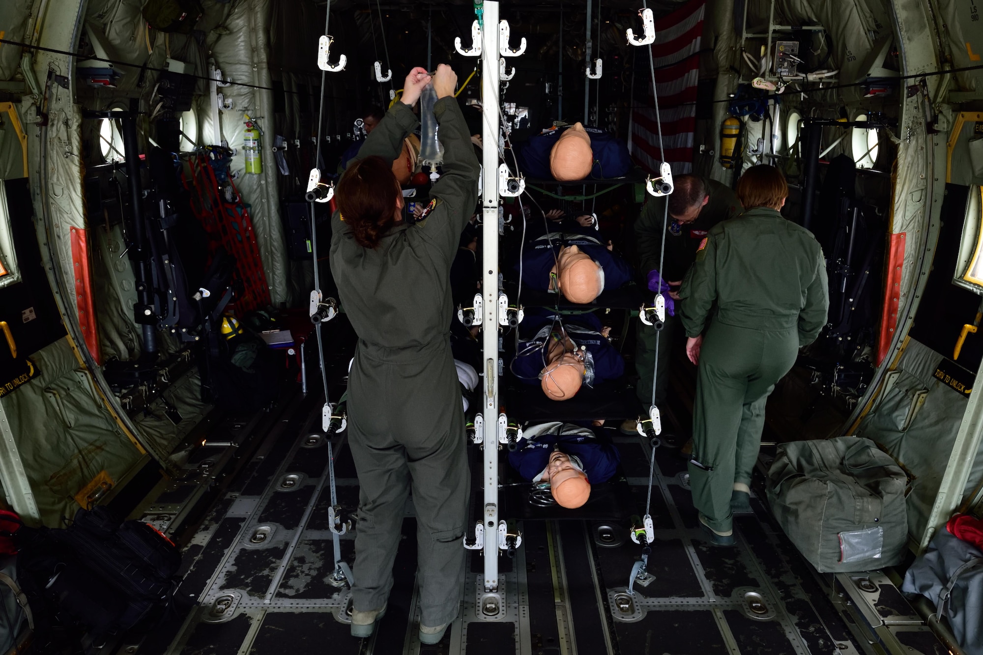 Members from various aeromedical evacuation squadrons secure simulated patients on an 815th Airlift Squadron C-130 Super Hercules aircraft at the Gulfport Combat Readiness Training Center, Mississippi, during an aeromedical evacuation exercise Nov. 1, 2017, for Southern Strike 2018. Southern Strike 2018 is a large-scale, joint multinational combat exercise that provides tactical level training for the full spectrum of conflict and emphasizes air dominance, maritime operations, maritime air support, precision engagement, close air support, command and control, personnel recovery, aeromedical evacuation, and combat medical support. (U.S. Air Force photo by Tech. Sgt. Ryan Labadens)