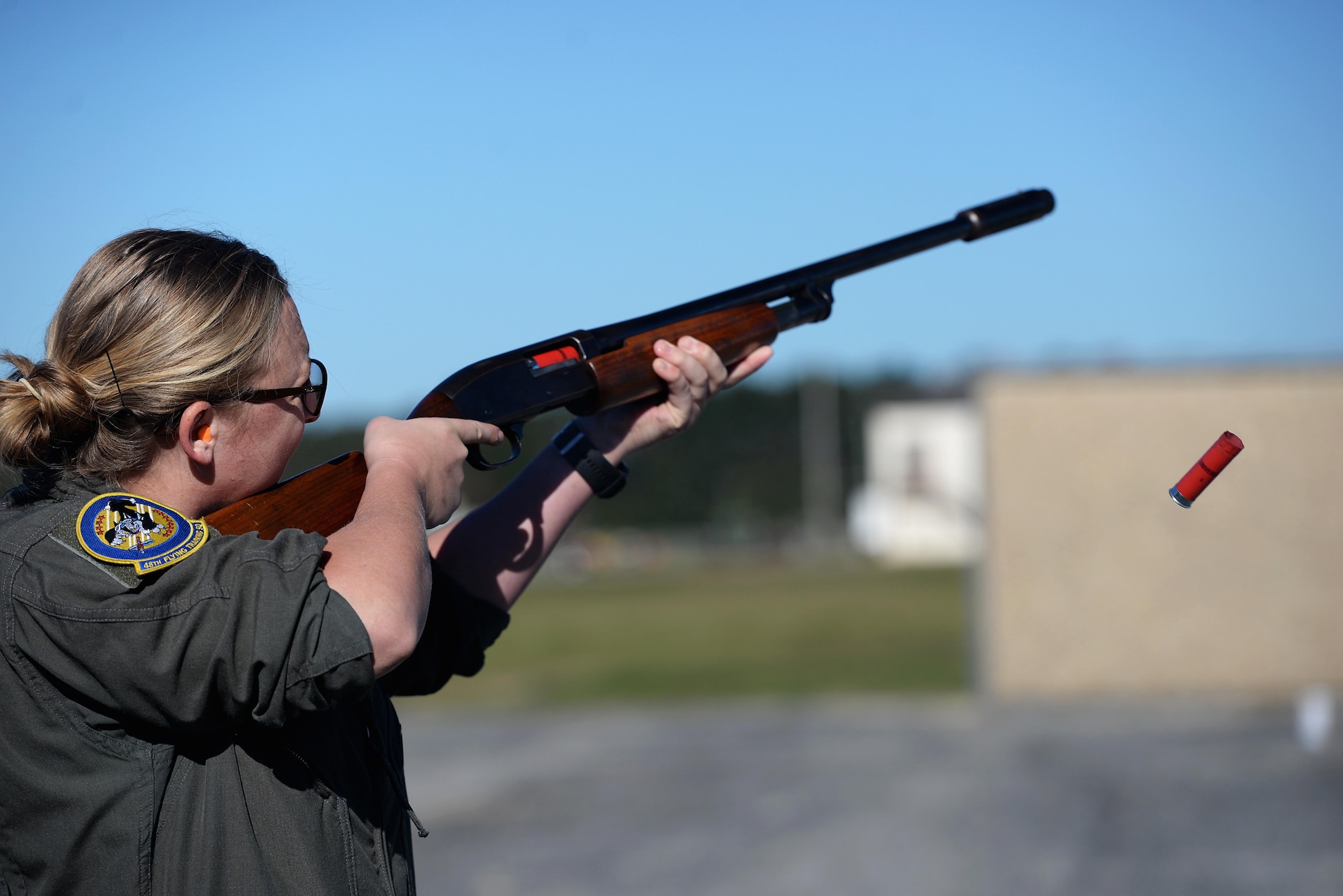 Capt. Taylin Eckols, 48th Flying Training Squadron instructor pilot, fires at a clay target Oct. 26, 2017, on Columbus Air Force Base, Mississippi. Instructor pilots competing in the turkey shoot event shot at 25 flying targets for a possible total of 100 points for this piece of the competition. (U.S. Air Force photo by Airman 1st Class Keith Holcomb)