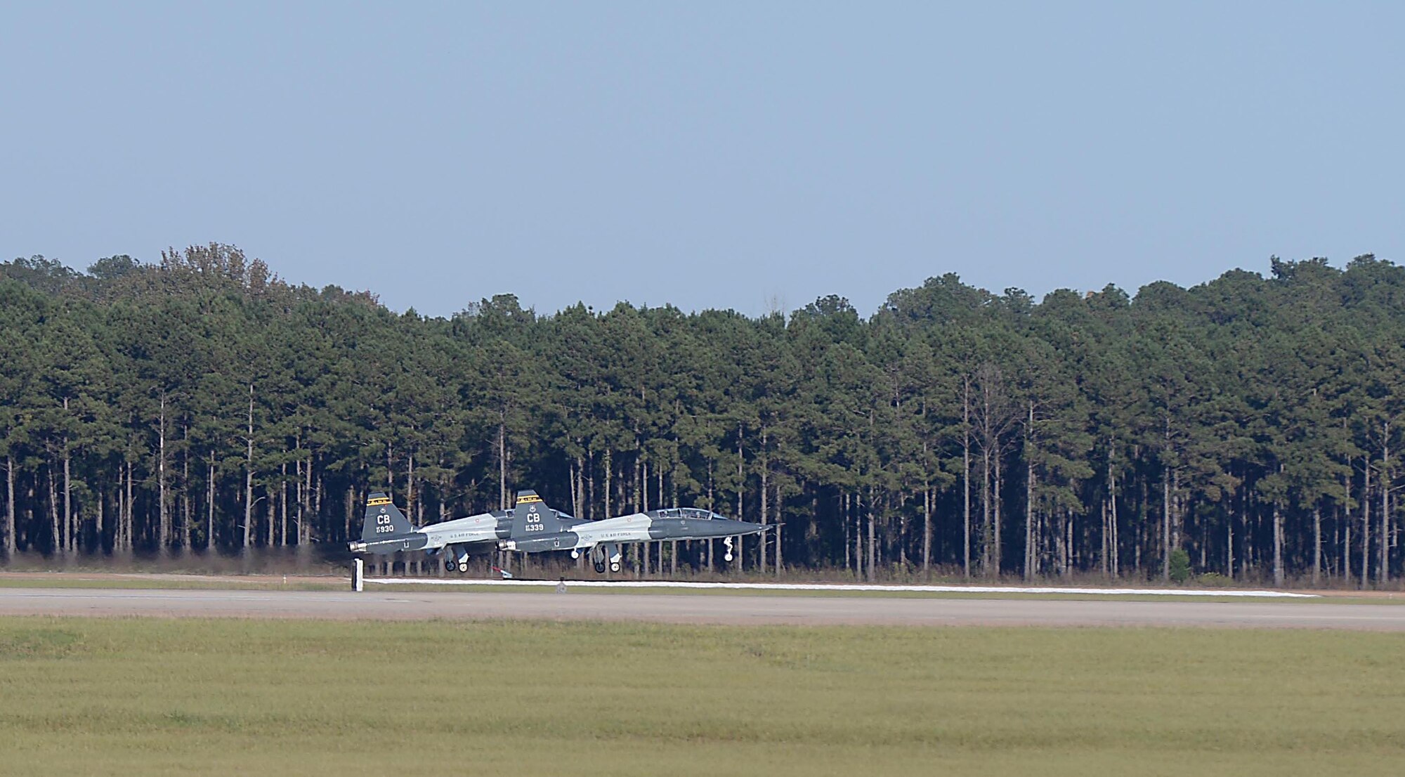 Two T-38 Talons land during the turkey shoot event Oct. 26, 2017, on Columbus Air Force Base, Mississippi. Two aircraft were graded and averaged together for the T-38 event because it was considered a formation flight. (U.S. Air Force photo by Airman 1st Class Keith Holcomb)