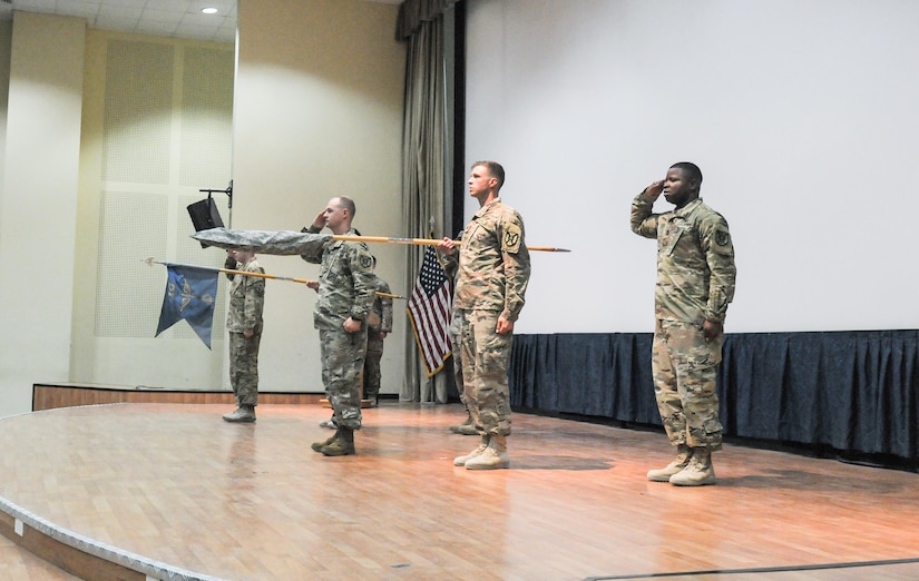 Soldiers conduct a transfer of authority ceremony.