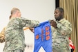 Soldiers conduct a transfer of authority ceremony.