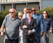 Loreene Wieger, mother of OSI agent David Wieger weeps during a ceremony honoring her Son at Travis Air Force Base, Calif., Nov. 1, 2017. David Wieger was killed in 2007 when an improvised explosive device struck his vehicle during his deployment in support of Operation Iraqi Freedom. The Office of Special Investigation, 12th Field Investigation Squadron, unveiled the renaming of their building to the fallen OSI agent. Wieger was stationed at Travis at the time and was posthumously awarded the Bronze Star, Purple Heart, AF Commendation Medal, and AF Combat Action Medal. (U.S. Air Force photo by Louis Briscese)
