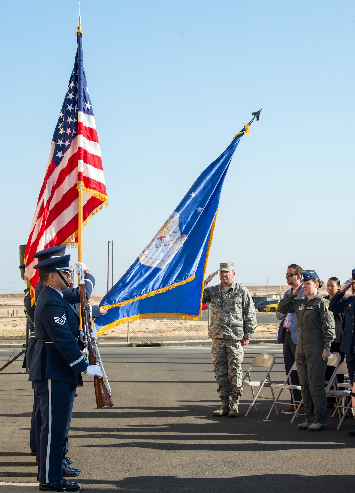 The honor guard present the Colors during a ceremony honoring OSI agent David Wieger during at Travis Air Force Base, Calif., Nov. 1, 2017. Wieger was killed in 2007 when an improvised explosive device struck his vehicle during his deployment in support of Operation Iraqi Freedom. The Office of Special Investigation, 12th Field Investigation Squadron, unveiled the renaming of their building to the fallen OSI agent. Wieger was stationed at Travis at the time and was posthumously awarded the Bronze Star, Purple Heart, AF Commendation Medal, and AF Combat Action Medal. (U.S. Air Force photo by Louis Briscese)
