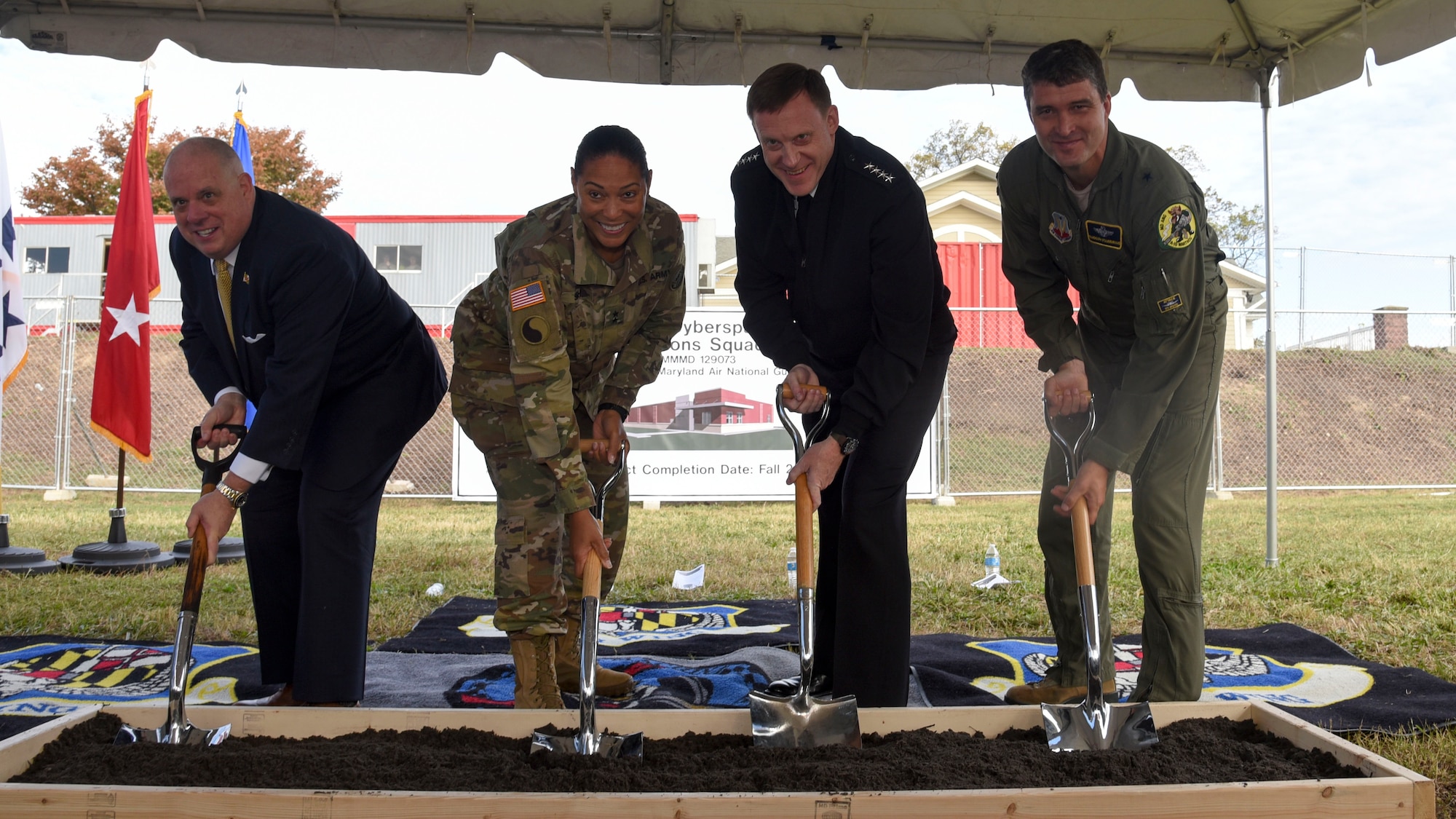 Maryland Gov. Larry Hogan, Maj. Gen. Linda Singh, the adjutant general of Maryland, Admiral Michael Rogers, Commander of U.S. Cyber Command and Director of the National Security Agency, and Gen. Randolph Staudenraus, 175th Wing Commander, break ground for the 175th Cyberspace Operations Squadron new facility, Nov. 2, 2017 at Fort George G. Meade, Maryland. The new building will be a single-story, 9,000-square-foot facility providing operational and command space for missions supporting Maryland, the National Security Agency and the United States Cyber Command. (U.S. Air National Guard photo by Senior Airman Enjoli Saunders)