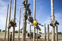 Airmen take part in a cable apprentice course at Sheppard Air Force Base, Texas, Oct. 18, 2017. During the training, instructors from the 364th Training Squadron taught the students how to safely climb wire poles and successfully perform their day-to-day mission. (U.S. Air Force photo by Alan R. Quevy)