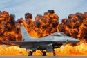 An Air Force F-16 Viper taxis just a few hundred feet from the wall of fire at the Fort Worth Alliance Air Show, Oct. 28, 2017 at Fort Worth, Texas. (Courtesy photo by Air Force Viper Demo Team)