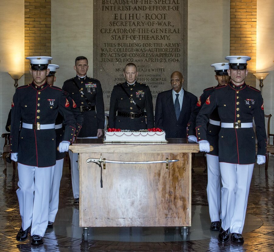 A cake cutting detail with Marine Barracks Washington D.C. marches through the rotunda of Roosevelt Hall during the National Defense University’s Marine Corps Birthday Ball at Fort McNair, Washington D.C., Nov. 2, 2017. The Barracks supports Marine Corps Birthday ceremonies throughout the National Capitol Region to honor and celebrate the birth of the Corps.