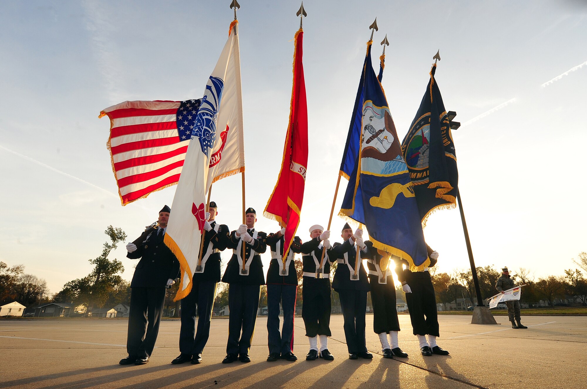 The U.S. Strategic Command’s honor guard posts the colors prior to leading members of team Offutt and tenant units in the 2011 Veterans Day parade held on Mission Avenue in Bellevue, Neb.