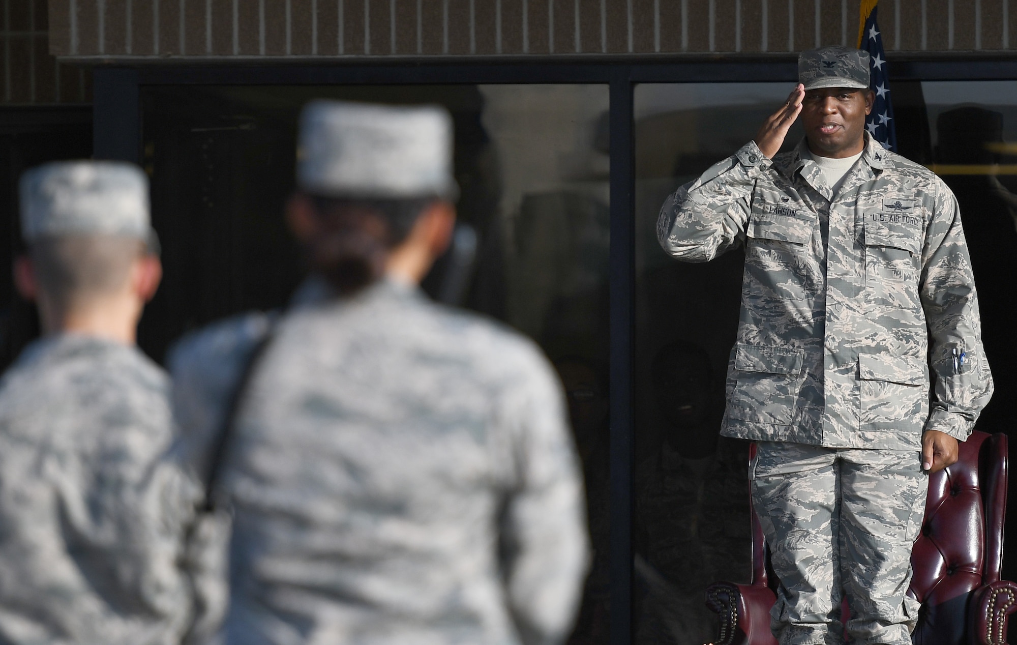 Col. Leo Lawson, Jr., 81st Training Group commander, grants permission to the 336th Training Squadron freestyle drill team to enter the field of freestyle drill competition during the 81st TRG drill down on the Levitow Training Support Facility drill pad Nov. 3, 2017, on Keesler Air Force Base, Mississippi. Airmen from the 81st TRG competed in the final quarterly open ranks inspection, regulation drill routine and freestyle drill routine. The 338th TRS Dark Knights took first place this quarter, while the 334th TRS Gators took first place for the year. (U.S. Air Force photo by Kemberly Groue)