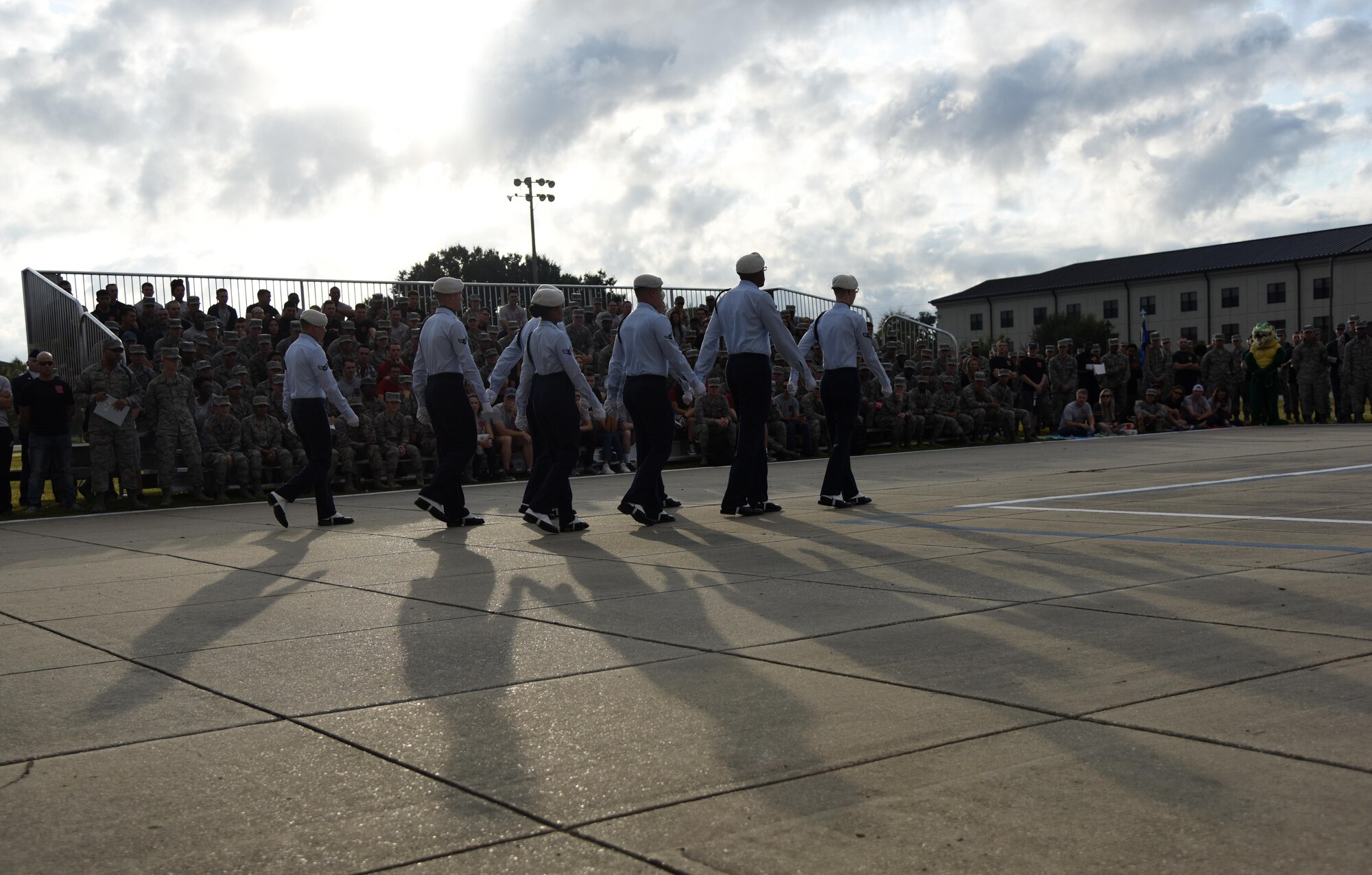 Members of the 334th Training Squadron regulation drill team perform during the 81st Training Group drill down on the Levitow Training Support Facility drill pad Nov. 3, 2017, on Keesler Air Force Base, Mississippi. Airmen from the 81st TRG competed in the final quarterly open ranks inspection, regulation drill routine and freestyle drill routine. The 338th TRS Dark Knights took first place this quarter, while the 334th TRS Gators took first place for the year. (U.S. Air Force photo by Kemberly Groue)