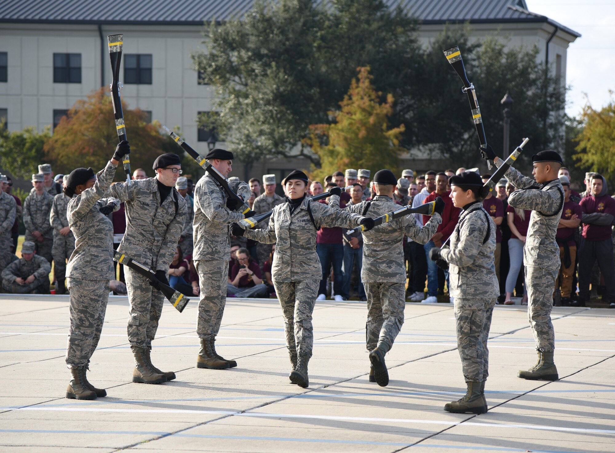 Members of the 334th Training Squadron freestyle drill team perform during the 81st Training Group drill down on the Levitow Training Support Facility drill pad Nov. 3, 2017, on Keesler Air Force Base, Mississippi. Airmen from the 81st TRG competed in the final quarterly open ranks inspection, regulation drill routine and freestyle drill routine. The 338th TRS Dark Knights took first place this quarter, while the 334th TRS Gators took first place for the year. (U.S. Air Force photo by Kemberly Groue)