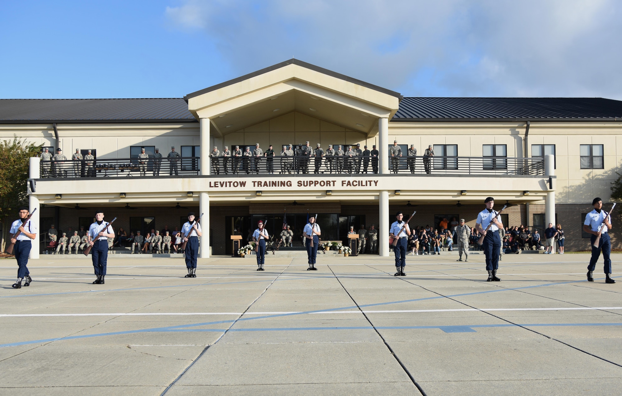 Members of the 335th Training Squadron freestyle drill team perform during the 81st Training Group drill down on the Levitow Training Support Facility drill pad Nov. 3, 2017, on Keesler Air Force Base, Mississippi. Airmen from the 81st TRG competed in the final quarterly open ranks inspection, regulation drill routine and freestyle drill routine. The 338th TRS Dark Knights took first place this quarter, while the 334th TRS Gators took first place for the year. (U.S. Air Force photo by Kemberly Groue)