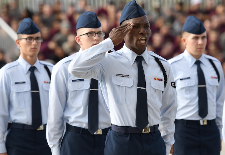 Airman 1st Class Michael Enkouang-Mekanda, 336th Training Squadron regulation drill team drillmaster, requests permission to enter the field of regulation drill competition during the 81st Training Group drill down on the Levitow Training Support Facility drill pad Nov. 3, 2017, on Keesler Air Force Base, Mississippi. Airmen from the 81st TRG competed in the final quarterly open ranks inspection, regulation drill routine and freestyle drill routine. The 338th TRS Dark Knights took first place this quarter, while the 334th TRS Gators took first place for the year. (U.S. Air Force photo by Kemberly Groue)