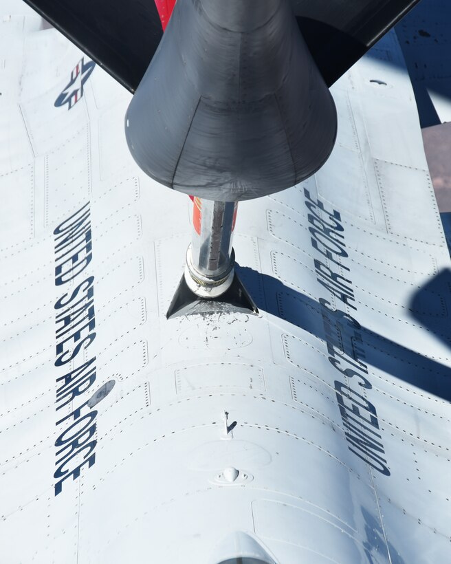 The boom of a KC-135 Stratotanker assigned to McConnell Air Force Base, Kan., refuels Thunderbird #2, piloted by Maj. Ryan Bodenheimer, Nov. 2, 2017.  An aircrew made up of four Reservists from the 18th and 924th Air Refueling Squadrons performed multiple refuelings to help the team make a non-stop, long-distance flight to their next show at Joint Base San Antonio, Texas.