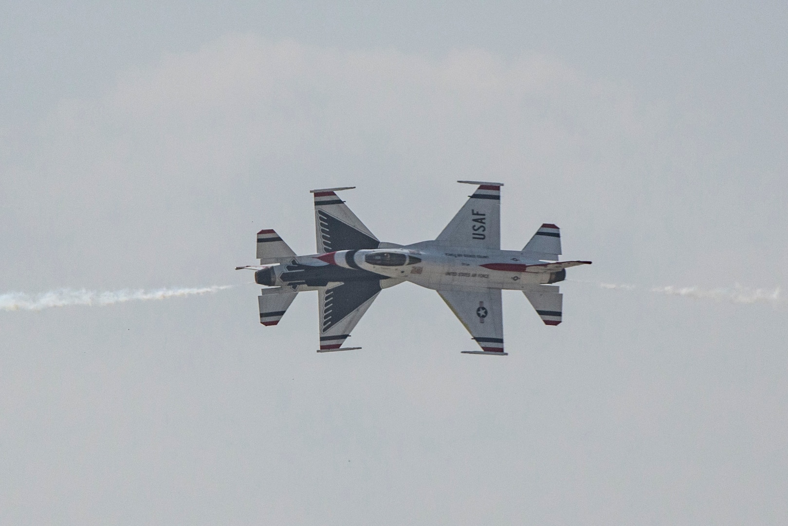 Members of the U.S. Air Force Aerial Demonstration Squadron “Thunderbirds” perform during the 2017 Joint Base San Antonio and Open House rehearsal day Nov. 3, 2017, at JBSA-Lackland, Kelly Field, Texas. Air shows allow the Air Force to display the capabilities of our aircraft to the American taxpayer through aerial demonstrations and static displays.  The air show will allow attendees to get up close and personal to see some of the equipment and aircraft used by the U.S. military today. (U.S. Air Force photo by Senior Airman Stormy Archer)