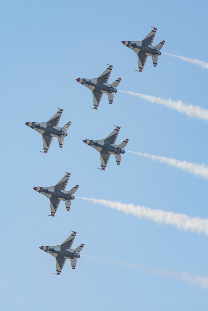 Members of the U.S. Air Force Aerial Demonstration Squadron “Thunderbirds” perform during the 2017 Joint Base San Antonio and Open House rehearsal day Nov. 3, 2017, at JBSA-Lackland, Kelly Field, Texas. Air shows allow the Air Force to display the capabilities of our aircraft to the American taxpayer through aerial demonstrations and static displays.  (U.S. Air Force photo by Senior Airman Stormy Archer)