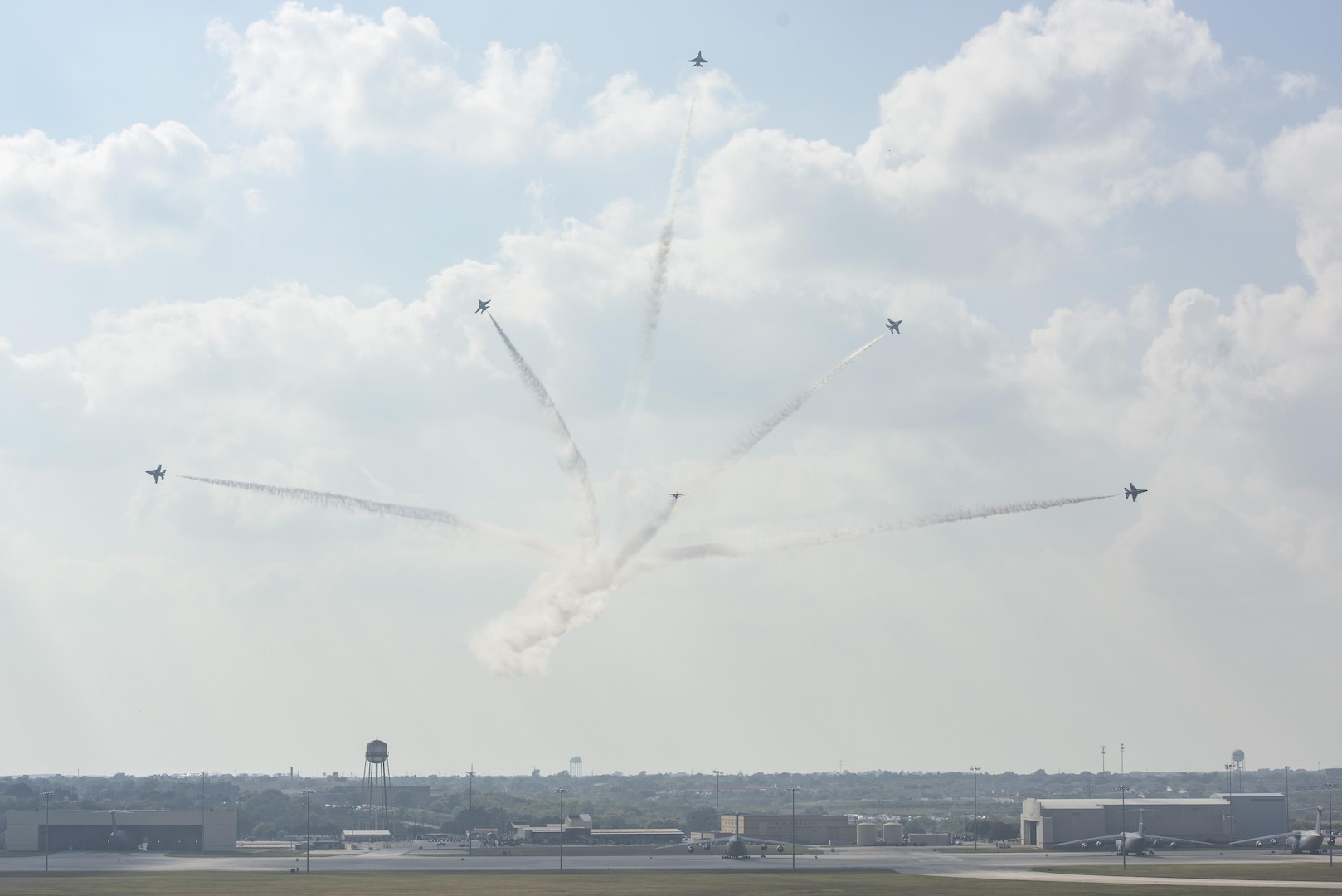 Members of the U.S. Air Force Aerial Demonstration Squadron “Thunderbirds” perform during the 2017 Joint Base San Antonio and Open House rehearsal day Nov. 3, 2017, at JBSA-Lackland, Kelly Field, Texas. Air shows allow the Air Force to display the capabilities of our aircraft to the American taxpayer through aerial demonstrations and static displays.  (U.S. Air Force photo by Senior Airman Stormy Archer)