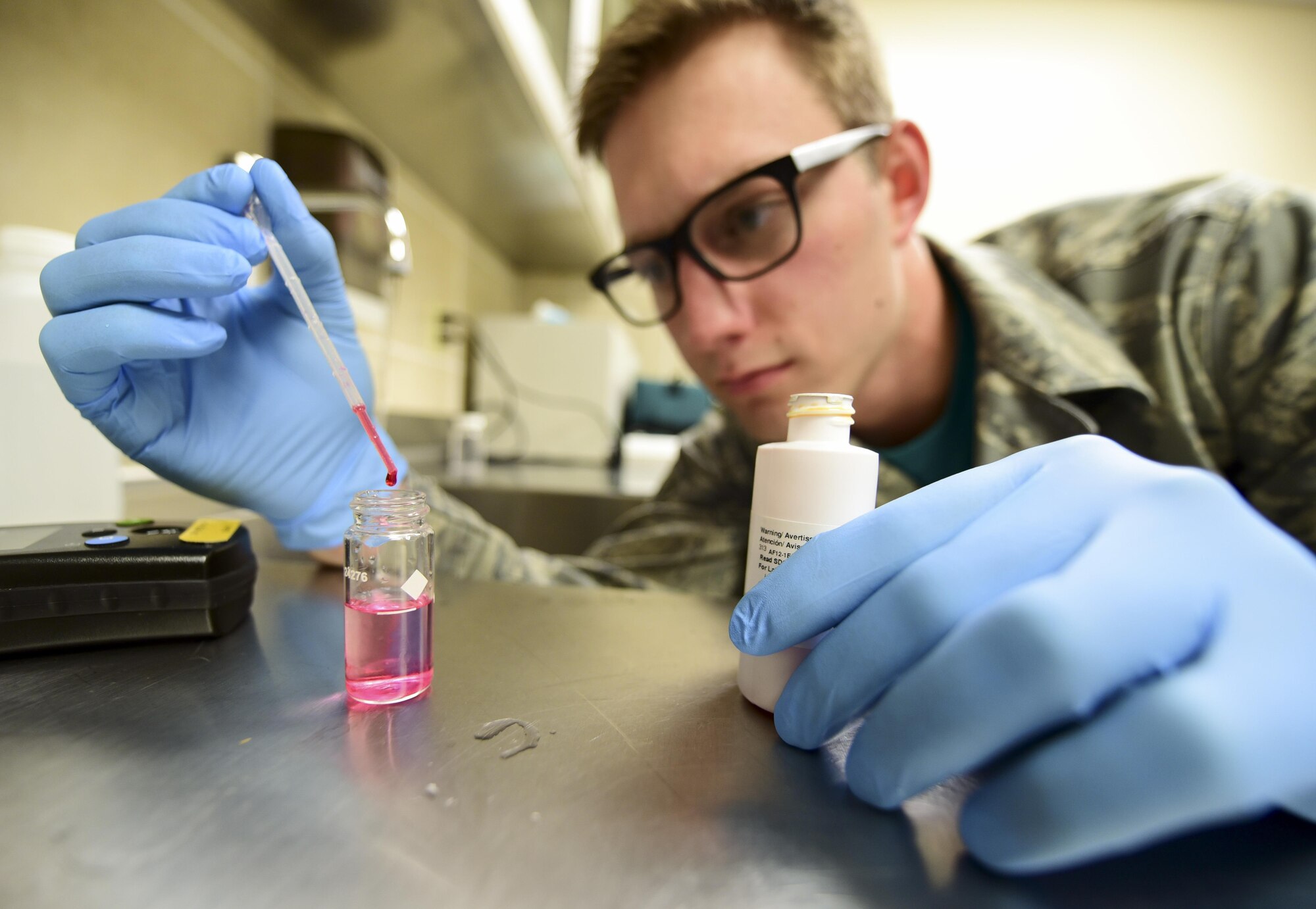 Senior Airman Jordan Loveless, 28th Medical Operations Squadron Bioenvironmental Engineering special surveillance program manager, tests the pH of a water sample inside a lab at Ellsworth Air Force Base, S.D., Oct. 27, 2017. Bioenvironmental Airmen are responsible for monitoring water quality on base monthly, as well as during contingencies. (U.S. Air Force photo by Airman 1st Class Randahl J. Jenson)