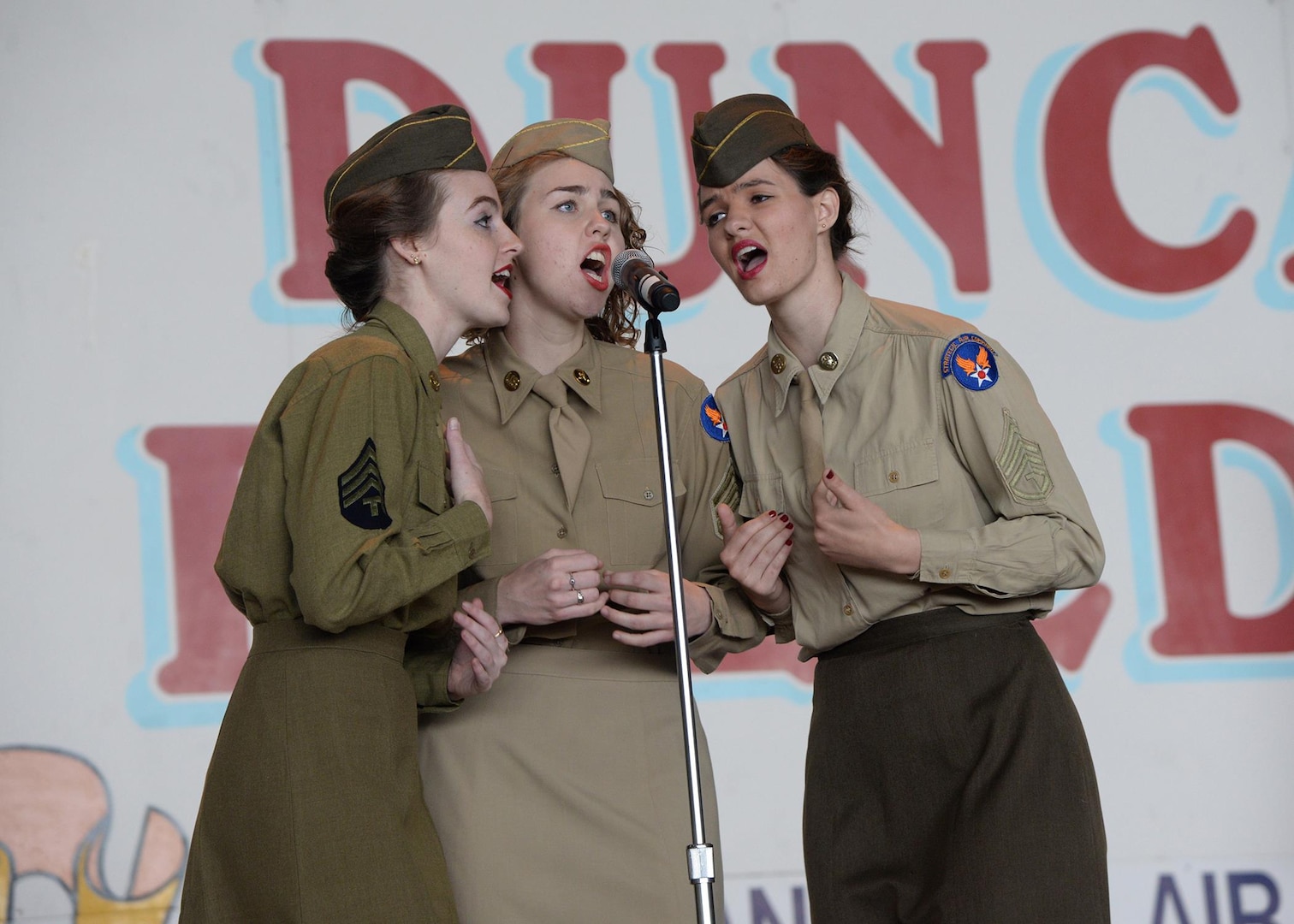 The Dillard Sisters perform during the 2017 Joint Base San Antonio Air Show and Open House Nov. 4, at JBSA-Lackland, Kelly Field Annex.  Air shows allow the Air Force to display the capabilities of our aircraft to the American taxpayer through aerial demonstrations and static displays.  The air show gives attendees an opportunity to get up close and personal to see some of the equipment and aircraft used by the U.S. military today. (U.S. Air Force photo by Melissa Peterson/Released)
