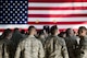 Airmen with the 374th Airlift Squadron wait and watch for the arrival of President Donald J. Trump, before a Troop Talk, Nov. 5, 2017, at Yokota Air Base, Japan.