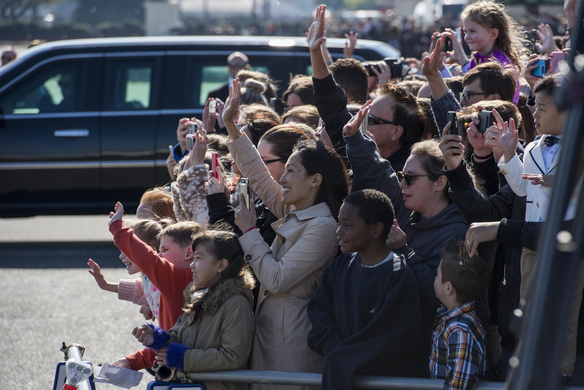 U.S. service member’s families wave to President Donald J. Trump, Nov. 5, 2017, at Yokota Air Base, Japan.