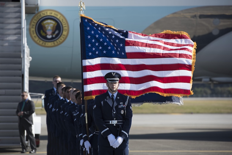 Yokota Air Base Honor Guard members wait in formation for the arrival of President Donald J. Trump, Nov. 5, 2017, at Yokota Air Base, Japan.