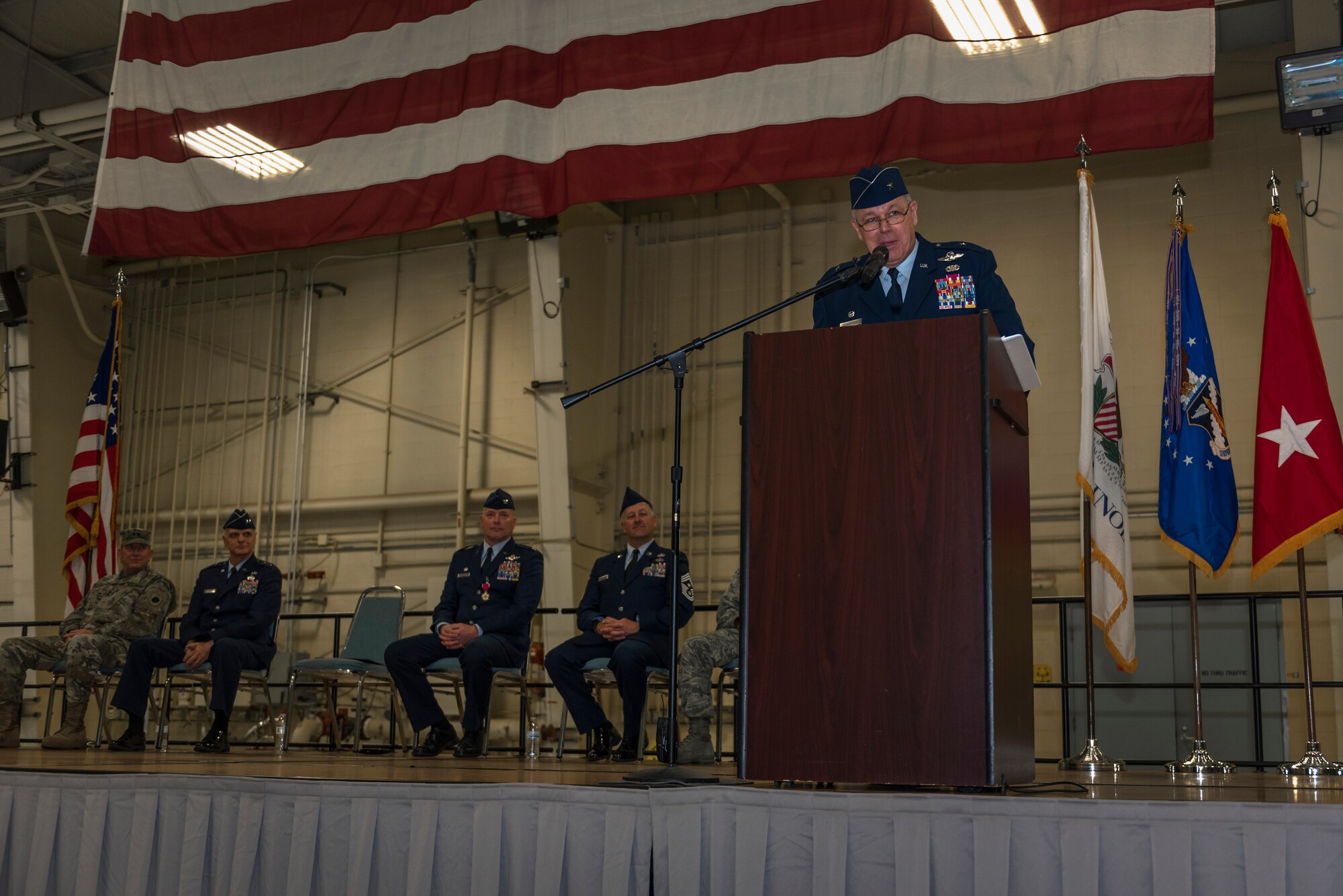 U.S. Air Force Brig. Gen. William Robertson, the chief of staff for the Illinois Air National Guard, speaks to the 182nd Airlift Wing at the conclusion of his change of command and promotion ceremony in Peoria, Ill., Nov. 4, 2017. Robertson commanded the wing for 13 years before being promoted to brigadier general and relinquishing command to Col. Daniel McDonough at the ceremony. (U.S. Air National Guard photo by Tech. Sgt. Lealan Buehrer)
