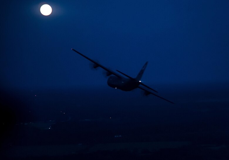 An 815th Airlift Squadron C-130J Super Hercules aircrew conducts a training flight over Keesler Air Force Base, Mississippi, Nov. 3, 2017. The Citizen Airmen practiced airdrops, flew with night vision goggles, and performed other tasks to prepare for missions in a deployed location. (U.S. Air Force photo by Staff Sgt. Shelton Sherrill)
