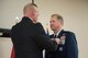 Army Maj. Gen. Stephen Hogan (left), adjutant general for the Commonwealth Kentucky, pins the Meritorious Service Medal onto Brig. Gen. Steven P. Bullard (right), the outgoing chief of staff, Headquarters, Kentucky Air National Guard, during Bullard’s retirement ceremony at the Kentucky Air National Guard Base in Louisville, Ky., on Oct. 22, 2017. Bullard is retiring after more than 30 years of service. (U.S. Air National Guard photo by Staff Sgt. Joshua Horton)