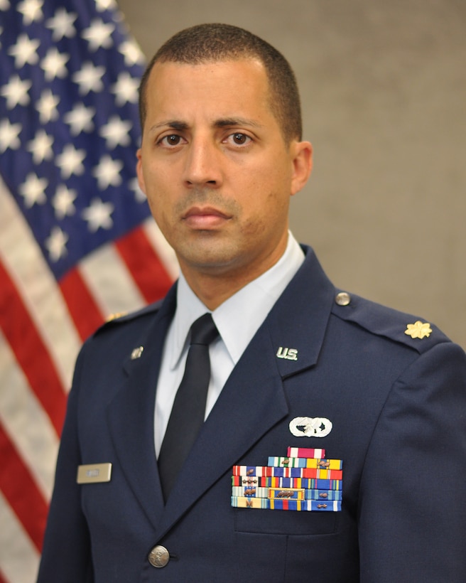 Maj. Damien Miller, 507th Logistics Readiness Squadron commander poses for his official photo here June 15, 2017. (U.S. Air Force Photo)