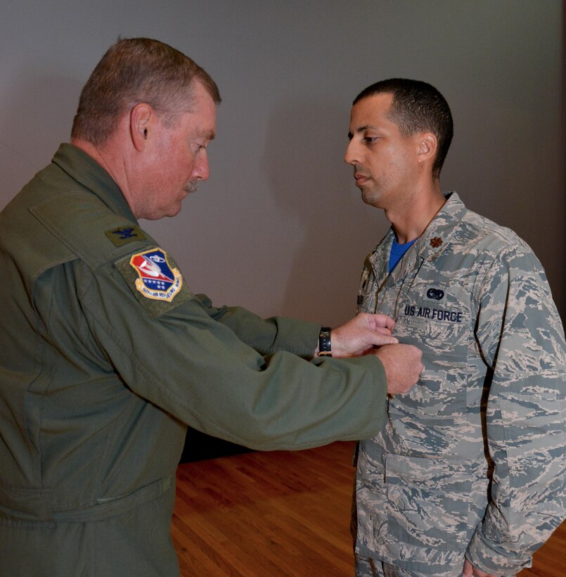 Maj. Damien Miller, 507th Logistics Readiness Squadron commander, receives the Bronze Star Medal from Col. Doug Gullion, 507th Air Refueling Wing commander, during a medal presentation here, Nov. 5, 2017. Miller received the medal for meritorious service in Iraq from Jan. 7 to July 8, 2017, while serving as the 442nd Air Expeditionary Squadron commander. Miller commanded all six coalition aerial ports within Iraq to transport 33,600 tons of cargo and 37,800 passengers on more than 4,500 missions. (U.S. Air Force Photo/Tech Sgt. Samantha Mathison)