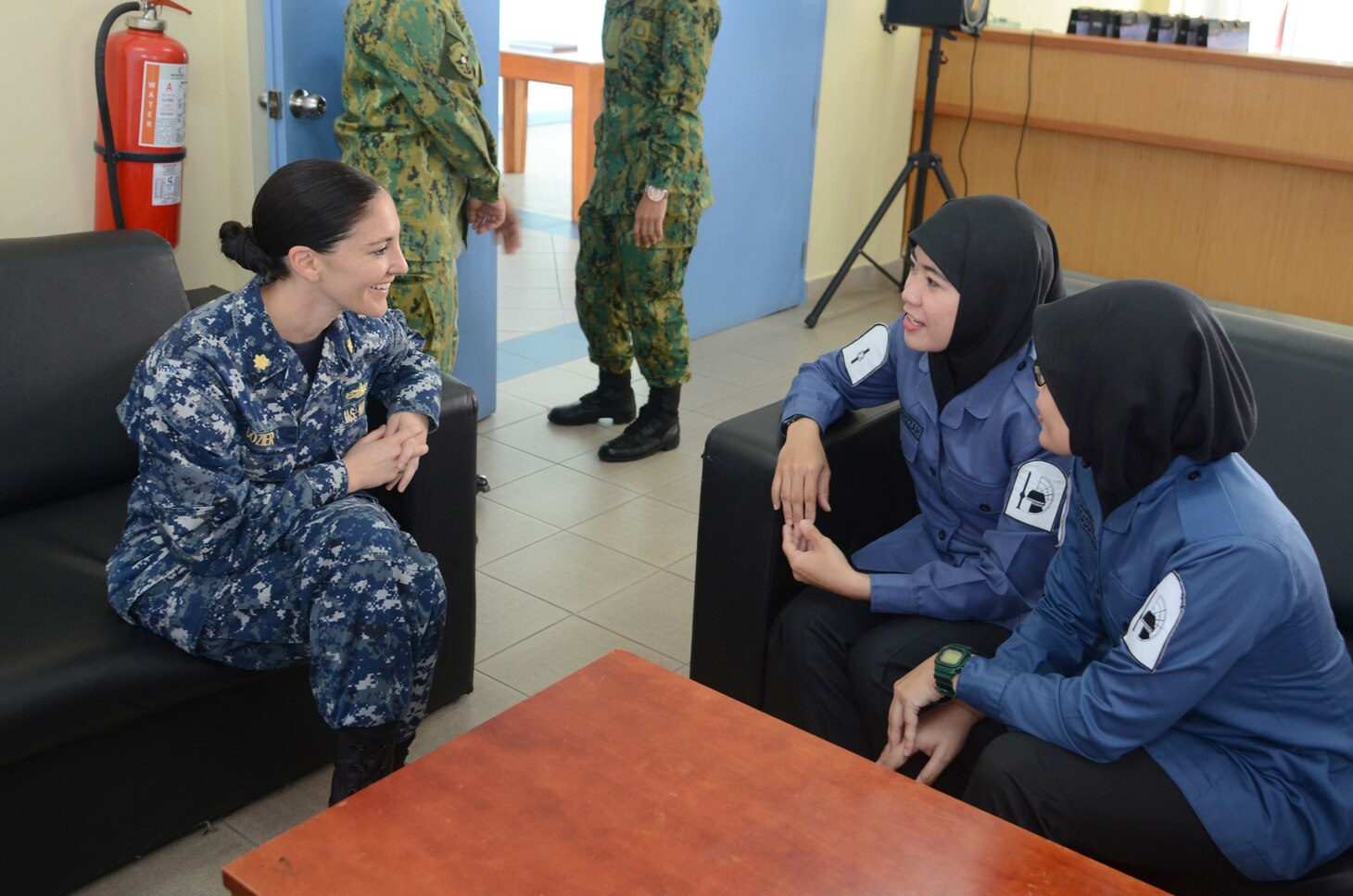 BRUNEI (Nov. 15, 2016) Lt. Cmdr. Meredith Dozier, operations officer attached to Destroyer Squadron Seven, participates in a women's symposium with members of the Royal Brunei Armed Forces during Cooperation Afloat Readiness and Training (CARAT) Brunei 2016, Nov. 15. CARAT is a series of annual maritime exercises between the U.S. Navy, U.S. Marine Corps and the armed forces of nine partner nations to include Bangladesh, Brunei, Cambodia, Indonesia, Malaysia, the Philippines, Singapore, Thailand, and Timor-Leste.