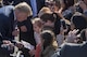 President Donald J. Trump signs a note from a young audience member, Nov. 5, 2017, at Yokota Air Base, Japan.