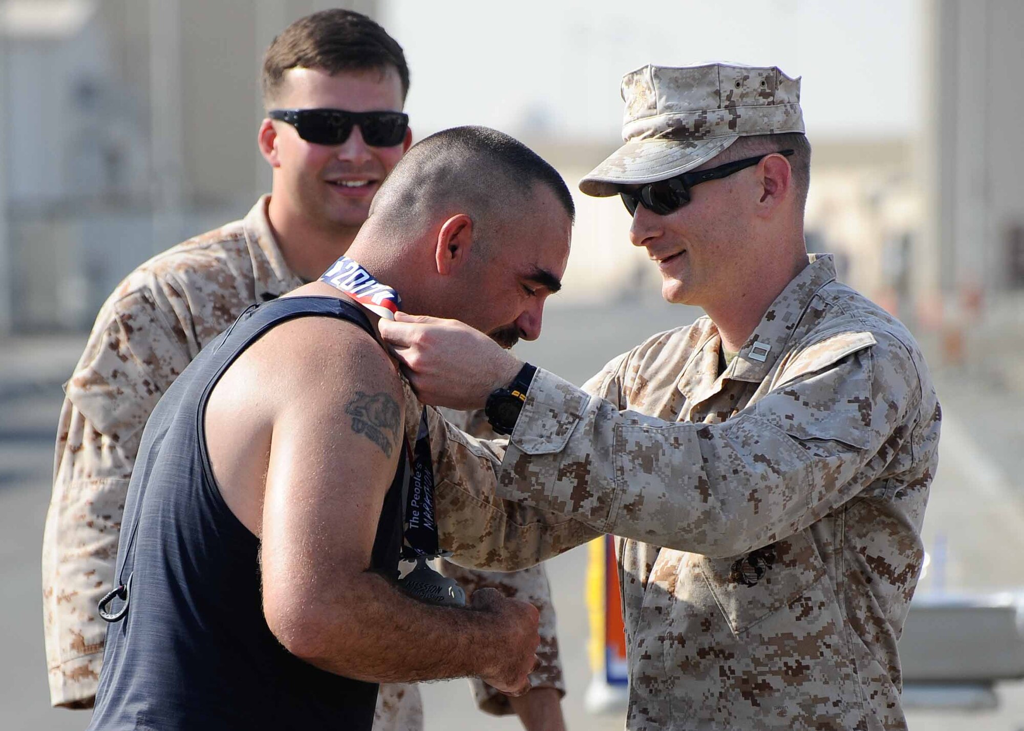 Military service members participating in the 42nd Annual U.S. Marine Corps Marathon-Forward take off from the starting line at at Al Dhafra Air Base, United Arab Emirates. Oct. 28, 2017. The official marathon, which was held in Virginia and Washington D.C., began in October 1975 and has grown to be the fourth largest marathon in the U.S. and the ninth largest in the world attracting upwards of twenty thousand runners each year. (U.S. Air Force photo by Staff Sgt. Colton Elliott)