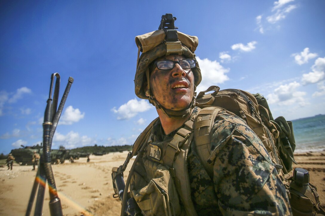 Sgt. Joshua C. Peeler provides security while participating in an amphibious landing during Blue Chromite 18.