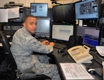 Airman Zachary Sherrod, 502nd Security Forces Squadron alarm monitor, works at the emergency dispatch desk at the base defense operations center at Joint Base San Antonio-Fort Sam Houston. Security forces squadrons at JBSA locations are in line to receive a total of $6 million in communications equipment upgrades, including new emergency dispatch consoles and hand-held radios, over the next two to three years.