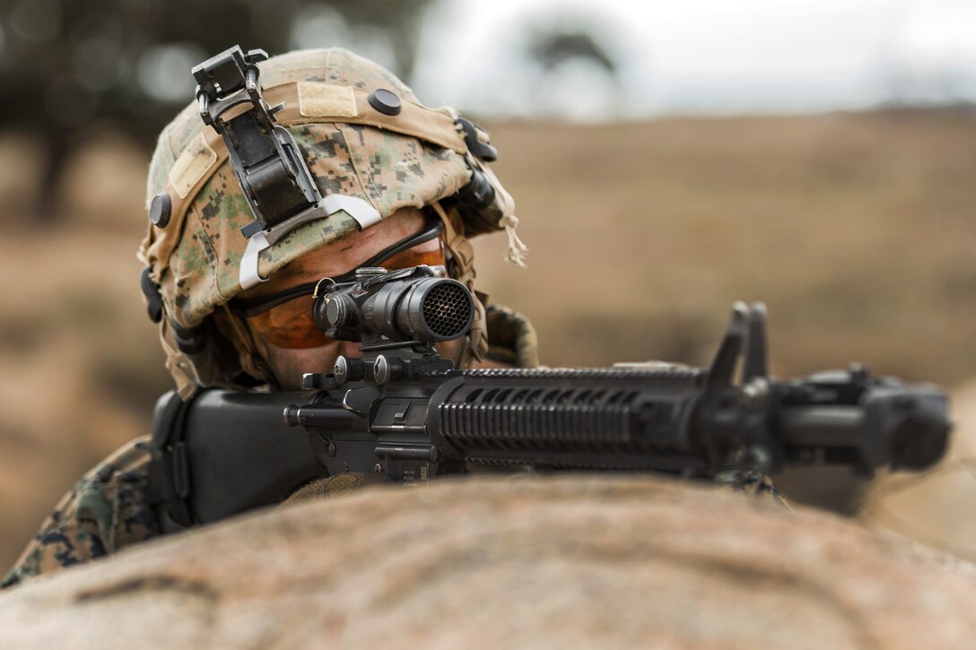 Marine Corps Cpl. Michael Malley scans his sector during a Sapper Leaders Course at Camp Pendleton, Calif.