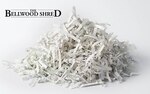 picture of pile of shredded paper with Bellwood shred at top.