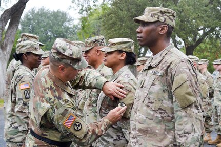 The 4th Brigade, 100th Training Division, officially transitioned to the 94th Training Division - Force Sustainment during a patch ceremony at Fort Sam Houston, Texas on Nov. 3, 2017. Soldiers assigned to the 4th Brigade serve as instructors for the 68 military occupational series. (U.S. Army Reserve Photo by Sgt. 1st Class Emily Anderson)